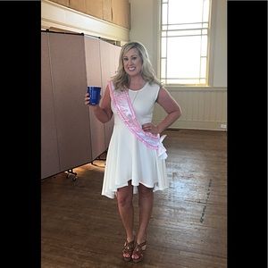 Beautiful white dress perfect for a bridal shower.